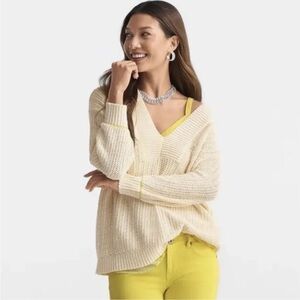 Cabi croquet pullover. V neck and cream with tiny yellow accents on sleeves.